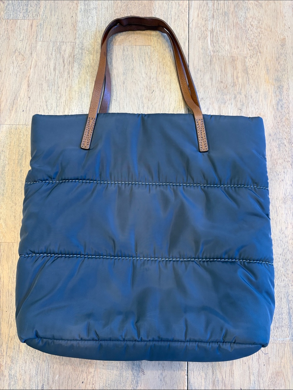 UGG, dark gray padded tote bag.